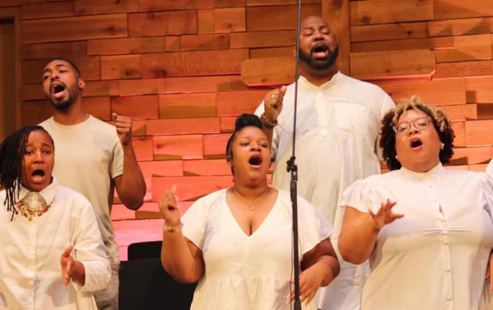 Contemporary Adult Choir singing in white