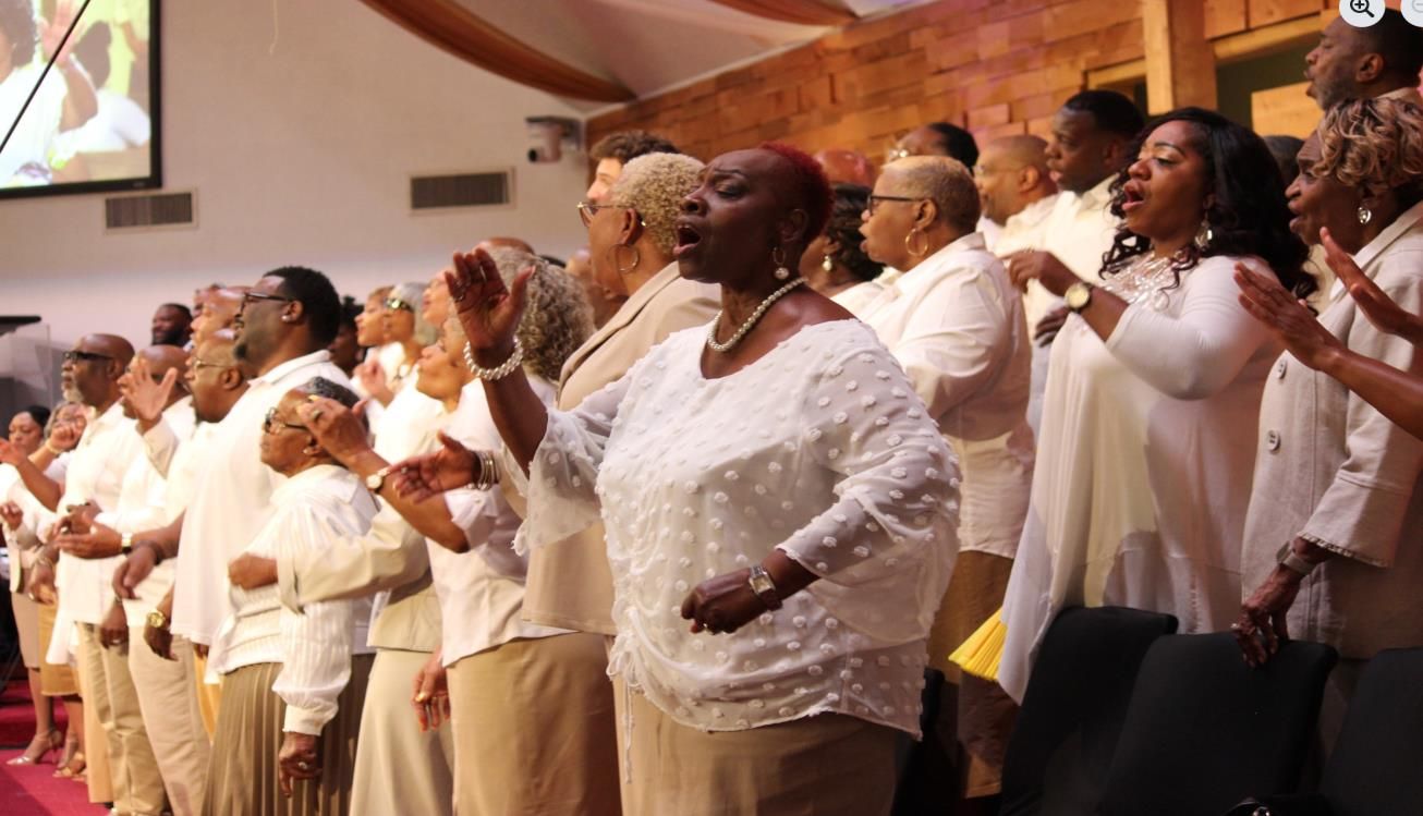 Dallas Chapter choir singing in white