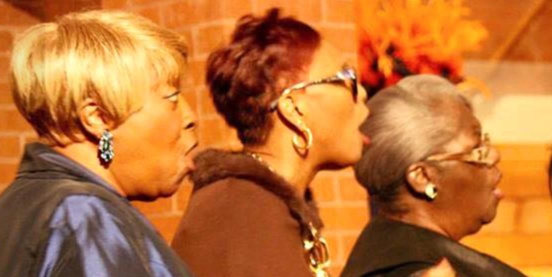 Singer leading during rehearsal